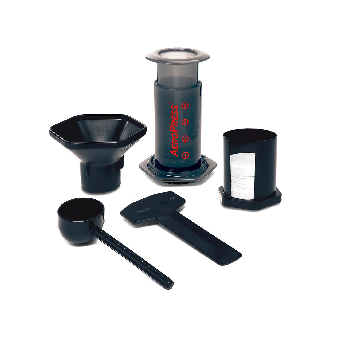 AeroPress coffee brewing device with components on a white background