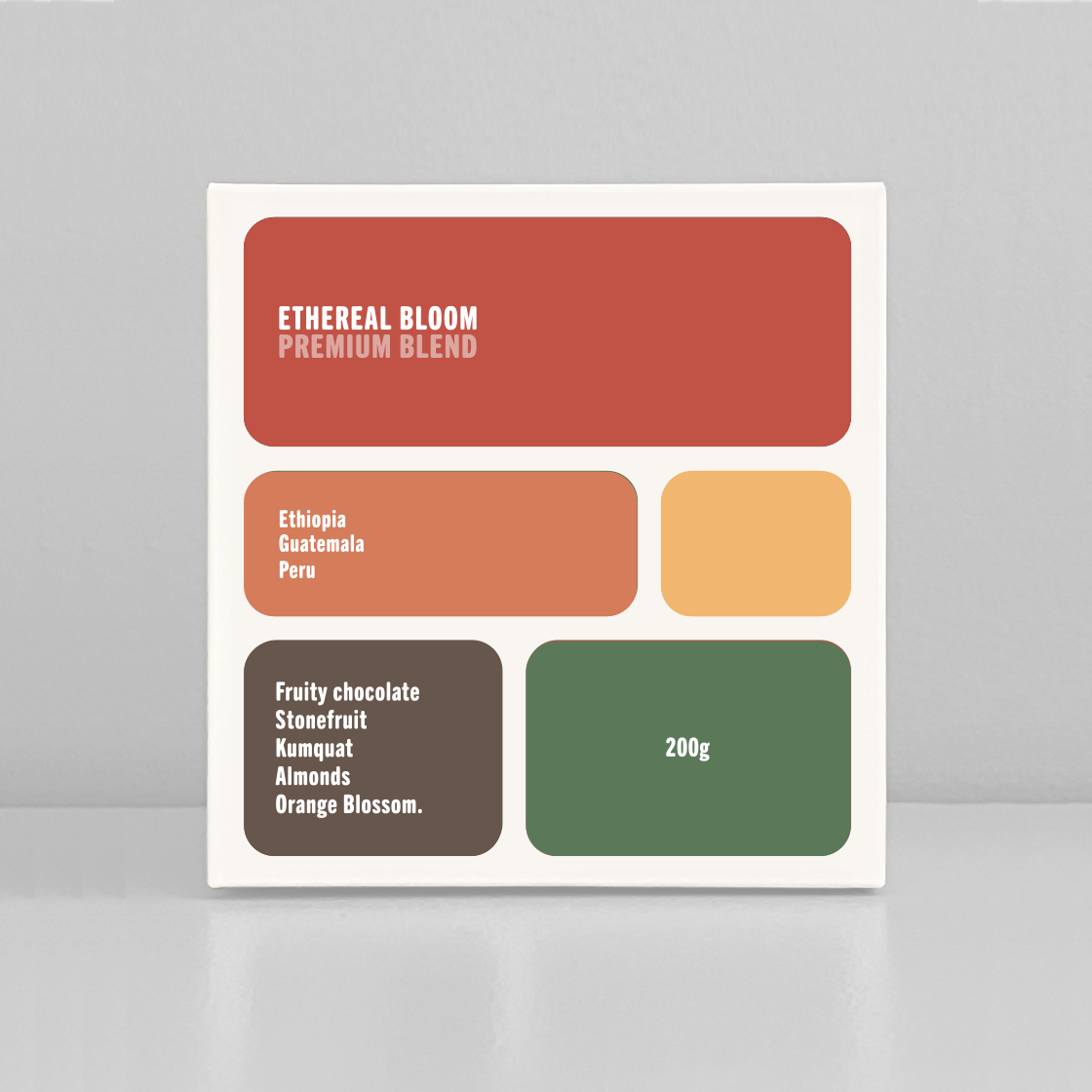 Coffee package labeled 'Ethereal Bloom Premium Blend' with color swatches and text on a gray background